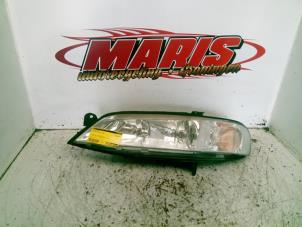 Gebruikte Linker Koplamp Opel Vectra B Caravan (31) 1.8 16V Prijs € 30,00 Margeregeling aangeboden door Autosloopbedrijf gebr. Maris