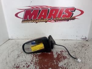 Gebruikte Buitenspiegel links Mazda 323 Fastbreak (BJ14) 2.0 16V Prijs € 25,00 Margeregeling aangeboden door Autosloopbedrijf gebr. Maris