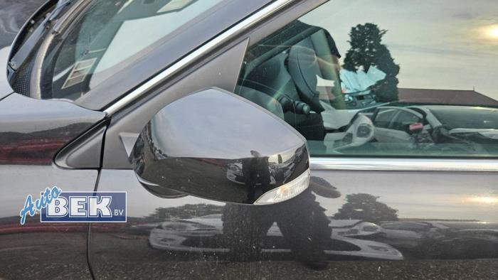 Spiegel Buiten links van een Renault Laguna III (BT) 1.5 dCi 110 2010