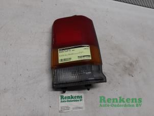 Gebruikte Achterlicht rechts Daihatsu Cuore (L251/271/276) 850,44 Prijs € 25,00 Margeregeling aangeboden door Renkens Auto-Onderdelen B.V.