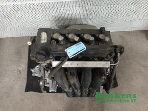 Gebruikte Motor Mitsubishi Colt (Z2/Z3) 1.3 16V Prijs € 300,00 Margeregeling aangeboden door Renkens Auto-Onderdelen B.V.