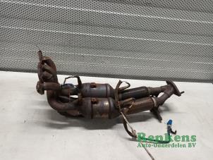 Gebruikte Uitlaatspruitstuk + katalysator Ford Focus 3 Wagon 1.6 Ti-VCT 16V 125 Prijs op aanvraag aangeboden door Renkens Auto-Onderdelen B.V.