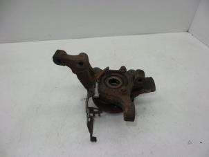 Gebruikte Asschenkel links-voor Opel Zafira (F75) 1.8 16V Prijs € 40,00 Margeregeling aangeboden door Auto Demontage Elferink B.V.