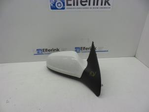 Gebruikte Spiegel Buiten rechts Opel Astra H GTC (L08) 1.8 16V Prijs € 45,00 Margeregeling aangeboden door Auto Demontage Elferink B.V.