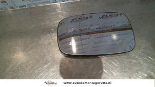 O86213 Gebruikte spiegelglas links Renault Scenic