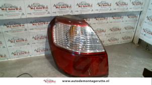 O93427 Gebruikte achterlicht links Subaru Legacy
