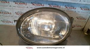 O73125 Gebruikte linker koplamp Toyota Corolla