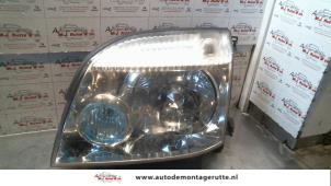 O72440 Gebruikte koplamp links Nissan X-Trail