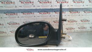 O85094 Gebruikte spiegel buiten links Ssang Yong Korando