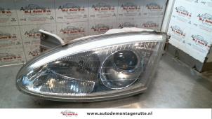 O72383 Gebruikte koplamp links Hyundai Coupe