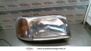 O74034 Gebruikte koplamp rechts Landrover Freelander