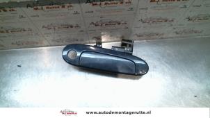 O80909 Gebruikte portiergreep 2deurs rechts Toyota Yaris