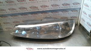 O72699 Gebruikte koplamp links Peugeot 406