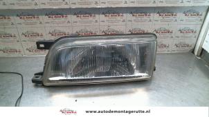O72402 Gebruikte linker koplamp Nissan Primera