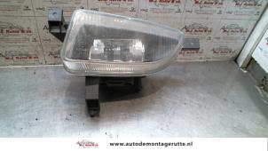 O75326 Gebruikte schijnwerper links Opel Zafira
