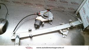 O77686 Gebruikte ruitmechaniek 2deurs links-voor Nissan Micra