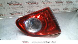 O93352 Gebruikte achterlicht links Nissan Qashqai