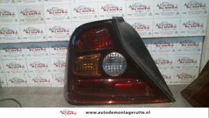 O93507 Gebruikte achterlicht links Daewoo Evanda