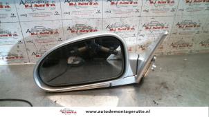 O84885 Gebruikte buitenspiegel links Hyundai Coupe
