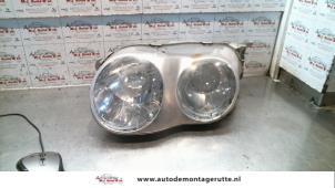 O72386 Gebruikte koplamp links Hyundai Coupe