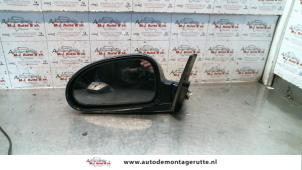 O84887 Gebruikte buitenspiegel links Hyundai Coupe