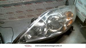 O72329 Gebruikte koplamp links Mazda 5.