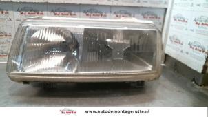 O72124 Gebruikte koplamp links Volkswagen Passat