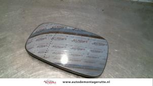 O86214 Gebruikte spiegelglas links Renault Scenic