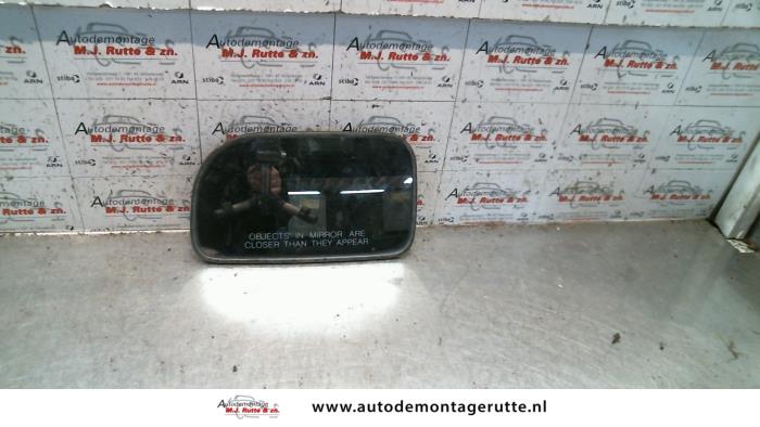 Gebruikte Spiegelglas links Kia Joice O86119