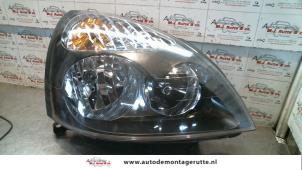 O74232 Gebruikte rechter koplamp Renault Clio