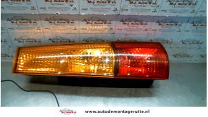 O95258 Gebruikte achterlicht rechts Subaru Justy