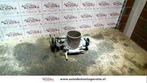 O122994 Gebruikte gasklephuis Subaru Legacy