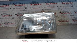 O73090 Gebruikte koplamp links Suzuki Alto