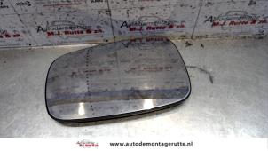 O86228 Gebruikte spiegelglas links Renault Grand Scenic
