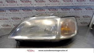 O72915 Gebruikte koplamp links Honda Civic
