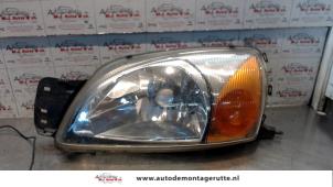 O71825 Gebruikte koplamp links Ford Fiesta
