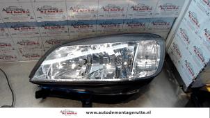 O71963 Gebruikte koplamp links Opel Zafira
