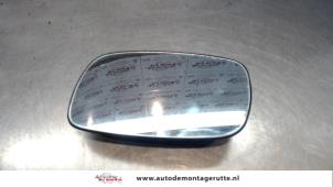 O85887 Gebruikte spiegelglas links Opel Astra