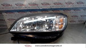 O71965 Gebruikte koplamp links Opel Zafira