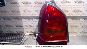 O94164 Gebruikte achterlicht links Suzuki Alto