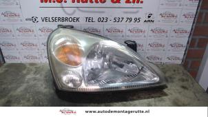 O74569 Gebruikte rechter koplamp Suzuki Liana
