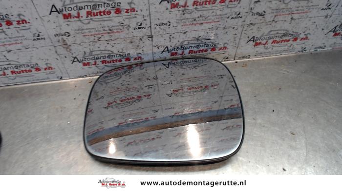 Gebruikte Spiegelglas links Nissan Kubistar O86097