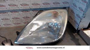 O12035 Gebruikte linker koplamp Ford Fiesta