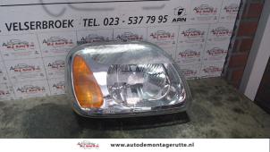 O73875 Gebruikte rechter koplamp Nissan Micra