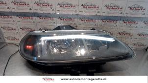 O74265 Gebruikte rechter koplamp Renault Laguna
