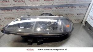 O72804 Gebruikte linker koplamp Renault Laguna