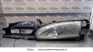 O71808 Gebruikte koplamp links Ford Mondeo