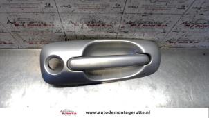 O81041 Gebruikte portiergreep 4deurs rechts-voor Dodge Ram Van