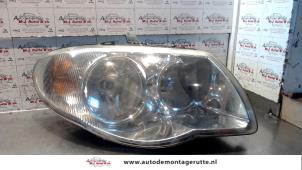 O73797 Gebruikte rechter koplamp Dodge Ram Van