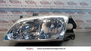 O72437 Gebruikte koplamp links Nissan Almera